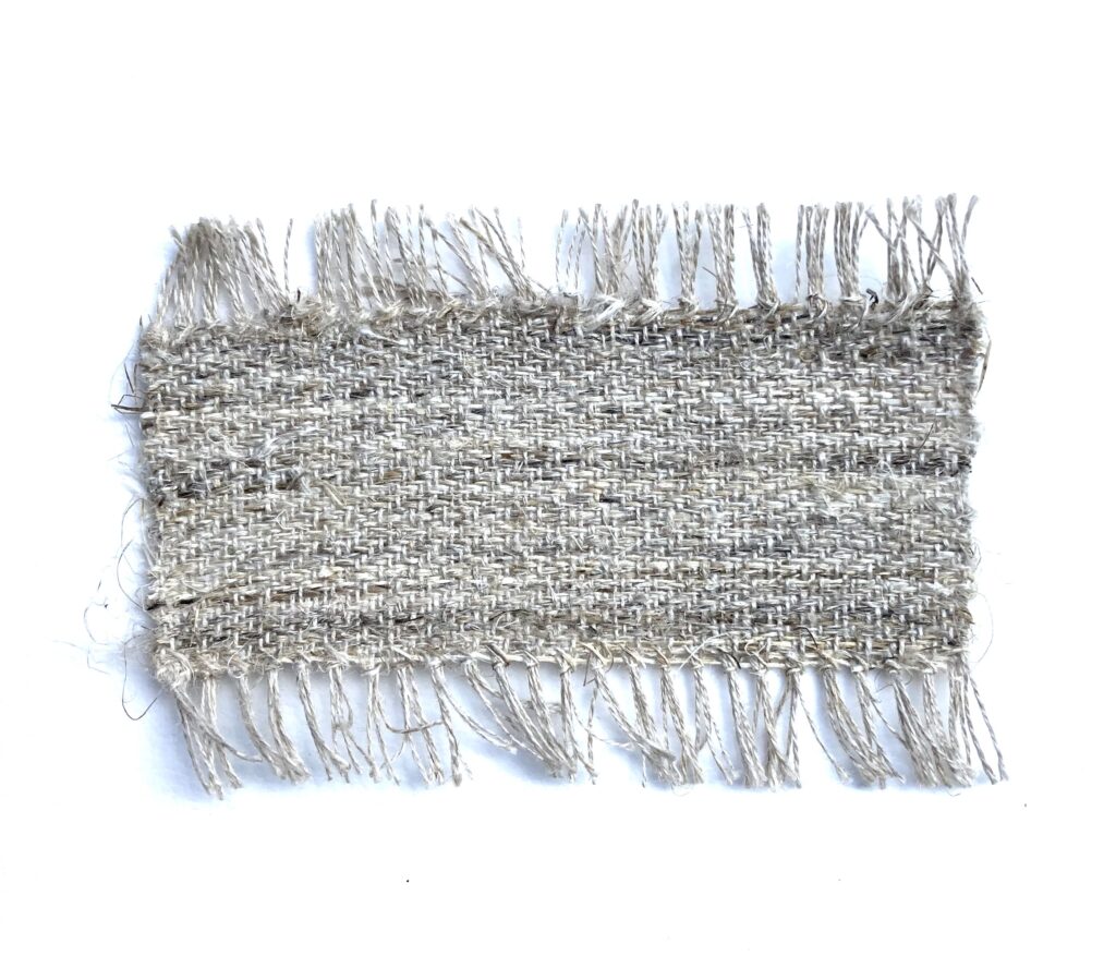 Spliced Milkweed twill Prototype, 2024, spliced milkweed bast fibre weft and commercial
linen warp, woven on floor loom, 12 cm x 9 cm